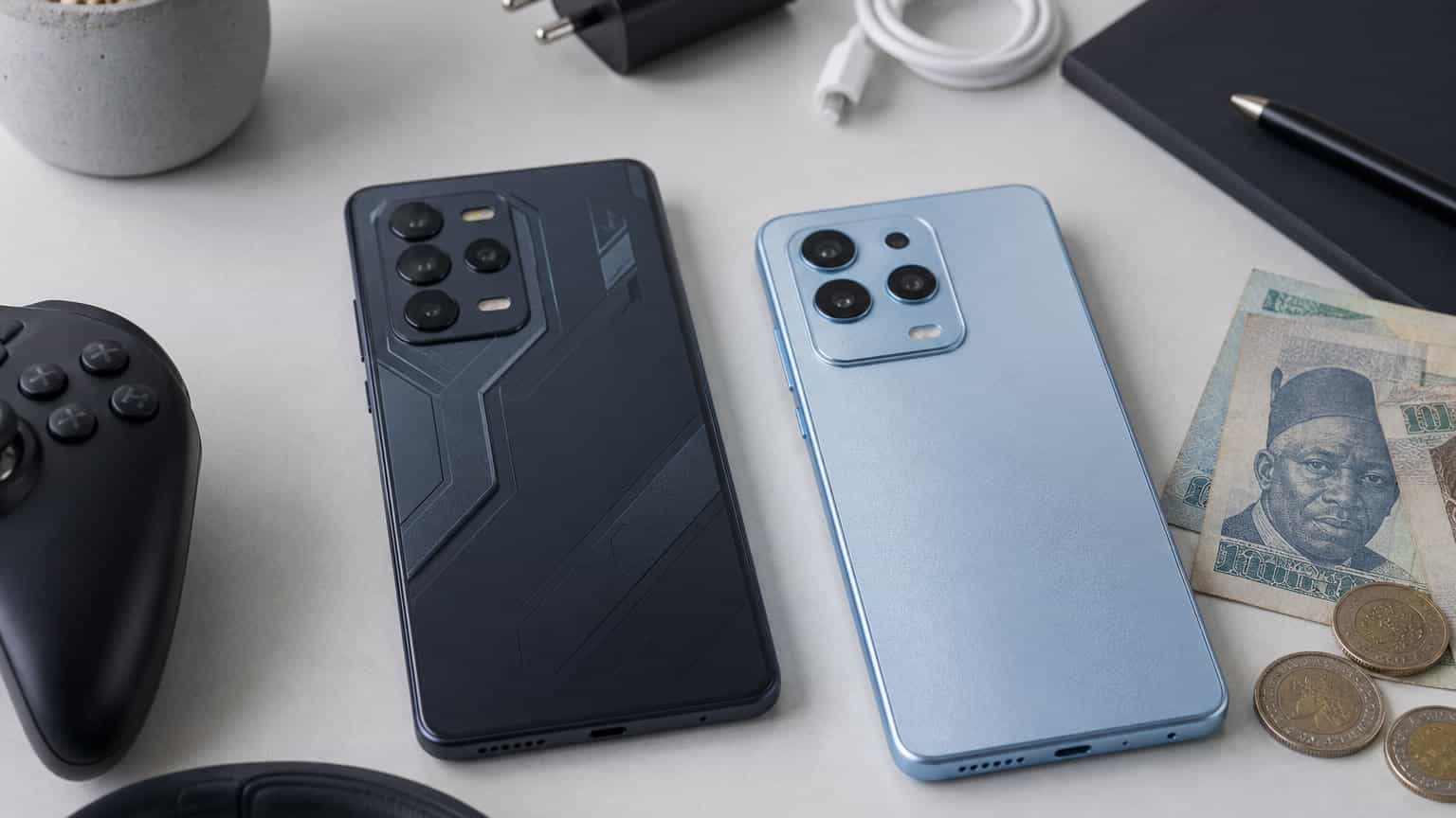 Two modern Android phones on a desk for an Infinix GT 30 Pro and Note 50 Pro buying comparison