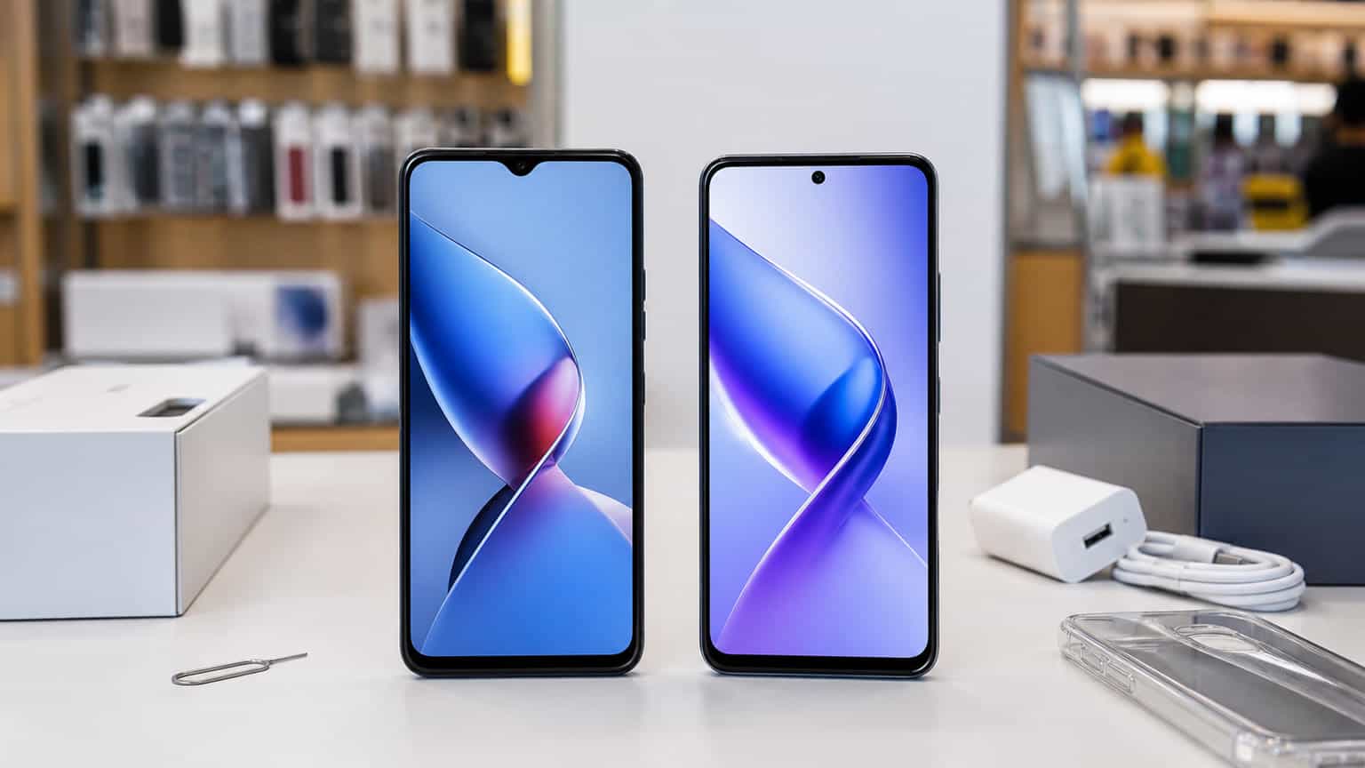 Tecno Spark 40 and Tecno Spark 40 Pro side by side on a clean comparison surface