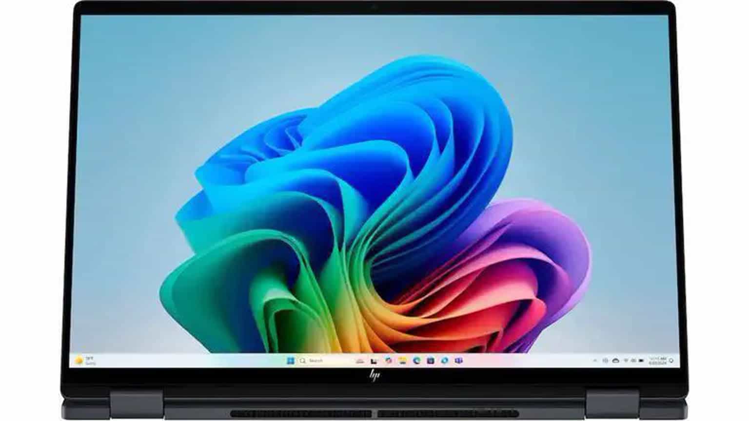 HP OmniBook X Flip 16-style convertible laptop on a clean desk setup