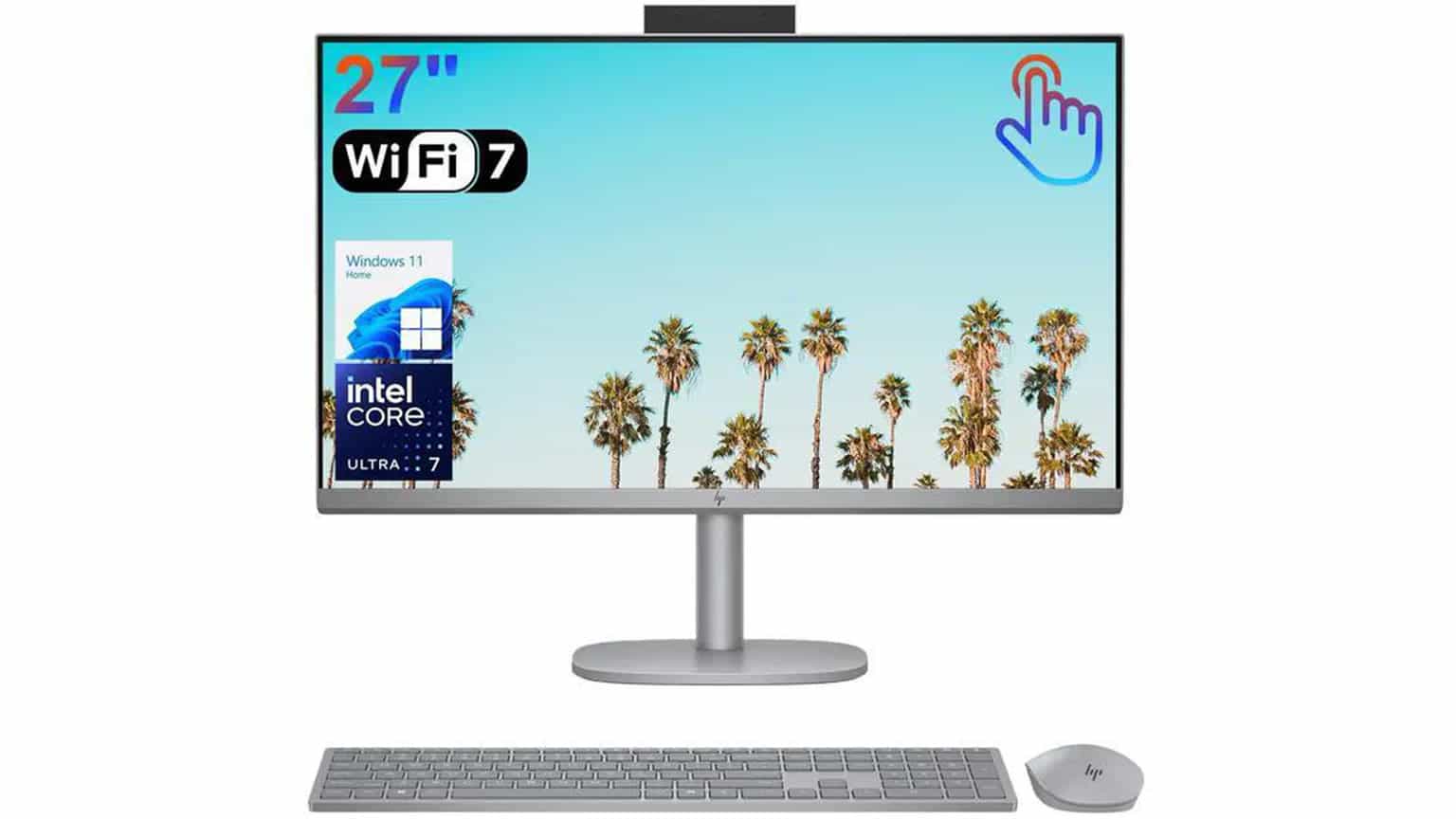 HP all-in-one desktop on a clean office desk with keyboard and mouse