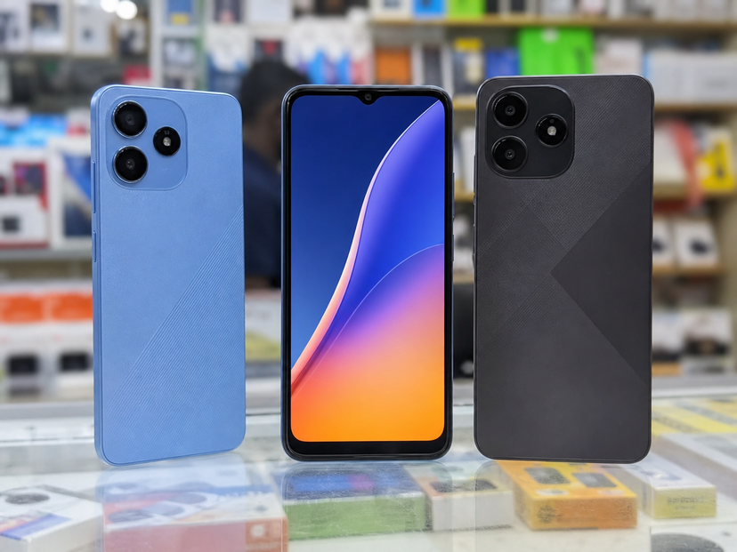 Three affordable smartphones compared on a retail counter