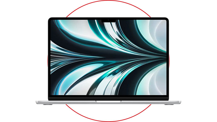 Close inspection scene showing MacBook Pro ports, MagSafe charging and SD card slot on a desk