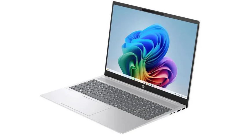 16-inch HP laptop workspace with documents, browser windows and accessories