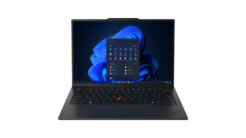 Close view of laptop ports with USB-C, USB-A, HDMI and headset accessories nearby
